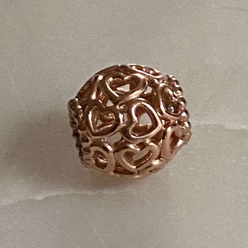 Pandora rose gold open hearts charm